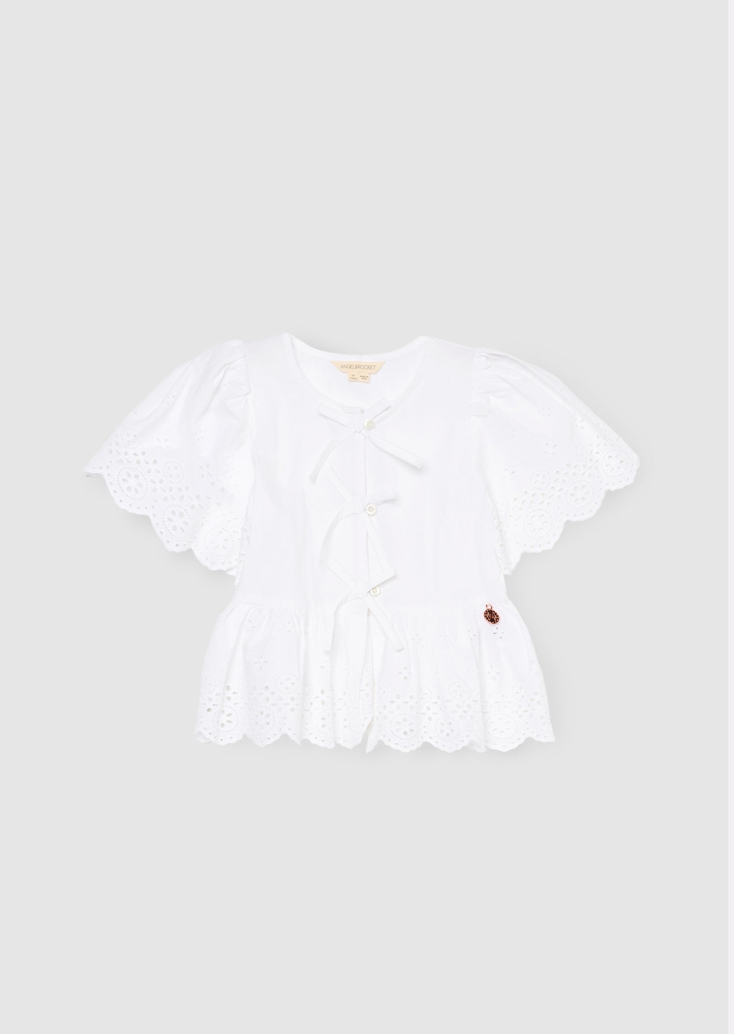 Ria Broderie Tie Front Peplum Top