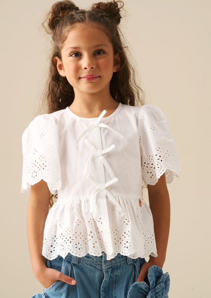 Ria Broderie Tie Front Peplum Top