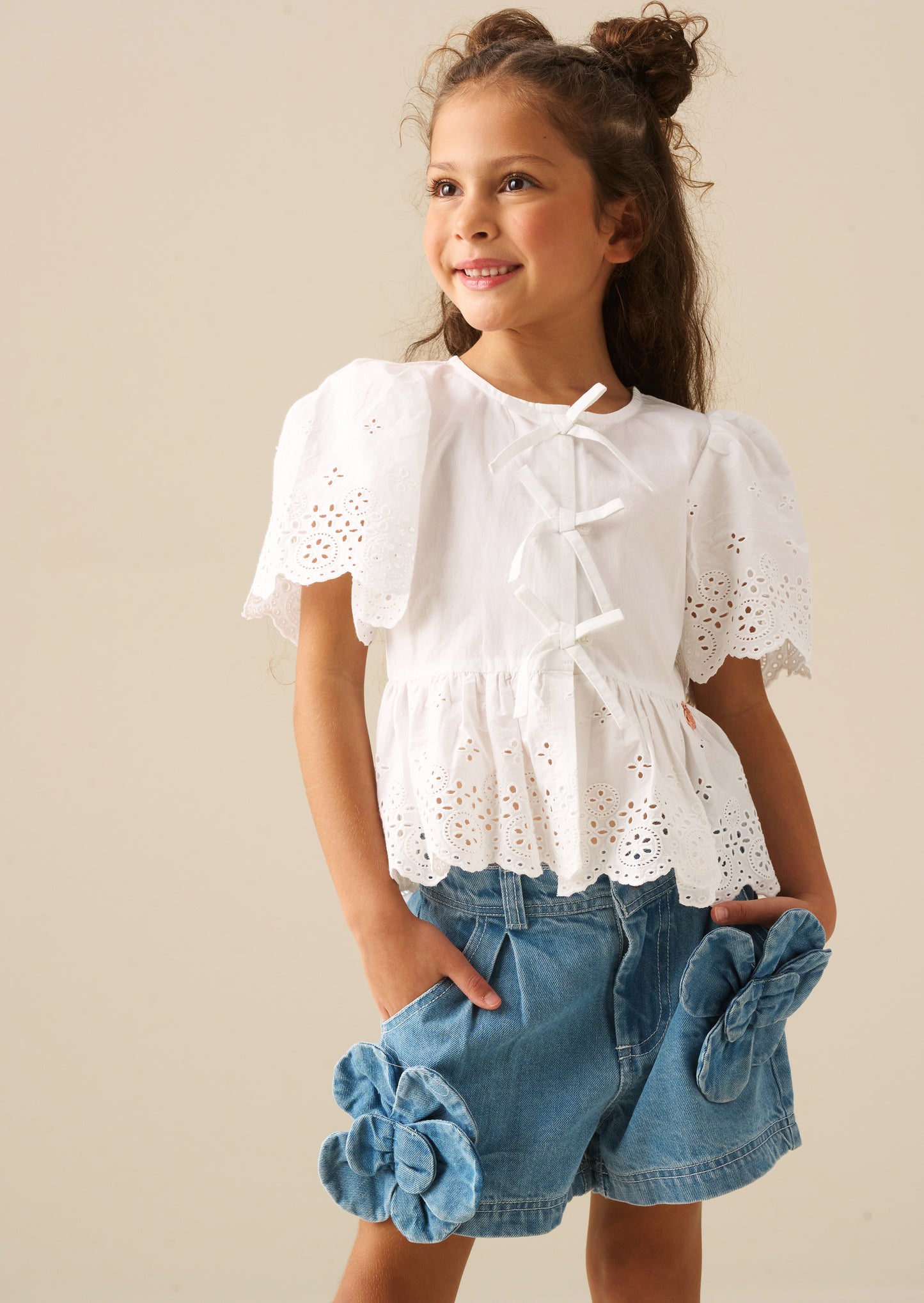 Ria Broderie Tie Front Peplum Top