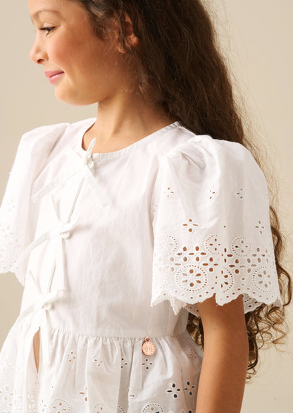 Ria Broderie Tie Front Peplum Top