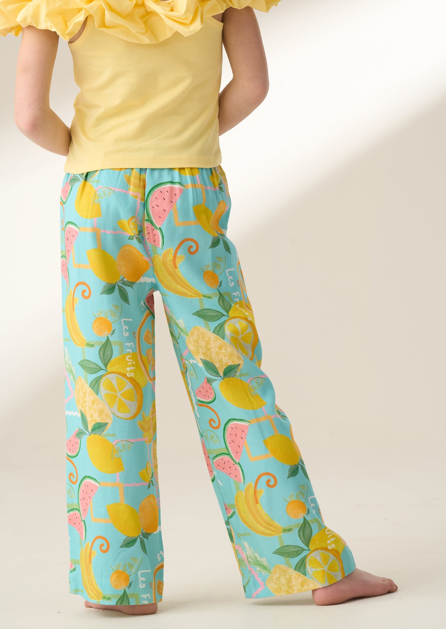 Lyla Blue Fruit Print Trousers